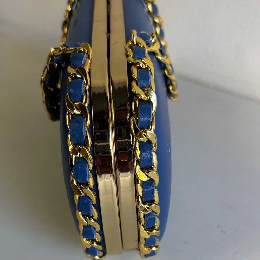 Chic Blue Pill Clutch with Gold Chain Accent